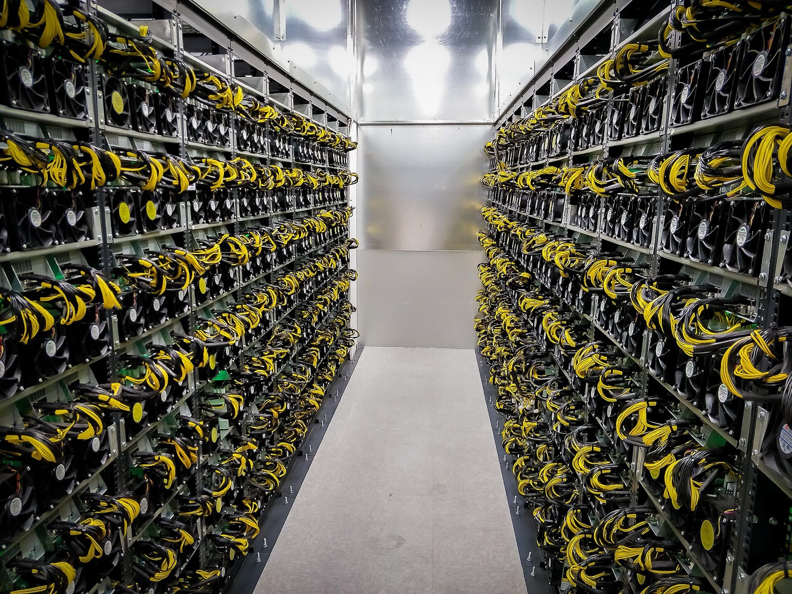Rows of ASIC miners in a Polaris hosting facility